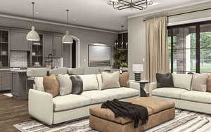 Living room with crown molding, dark wood-type flooring, and a chandelier