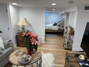 Bedroom featuring wood-type flooring