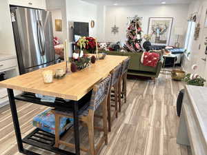 Dining area featuring light wood-type flooring