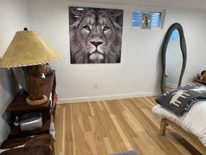 Living area with hardwood / wood-style flooring