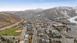 Birds eye view of property with a mountain view