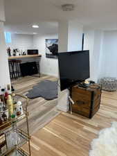 Living room featuring wood-type flooring