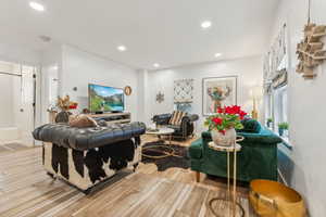 Living room featuring light hardwood / wood-style flooring