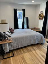 Bedroom featuring hardwood / wood-style floors