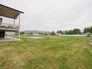 View of yard featuring a mountain view