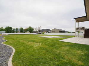 View of yard with a patio area