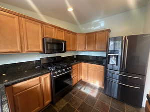 Kitchen with appliances with stainless steel finishes