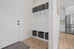 Mudroom featuring light hardwood / wood-style flooring