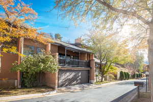 Exterior view with garage and balcony