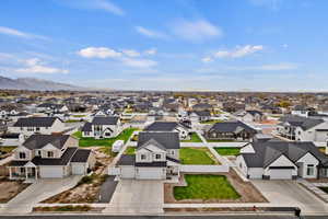 Birds eye view of property with a mountain view