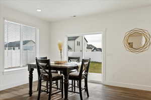 Dining space featuring hardwood / wood-style floors