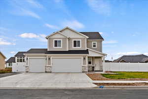 Craftsman-style house featuring a garage