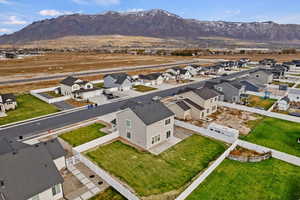 Birds eye view of property with a mountain view