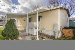 Exterior space featuring a carport