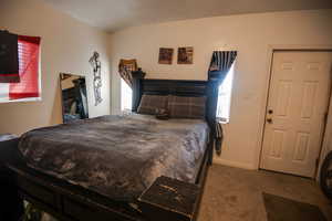 Bedroom featuring carpet flooring