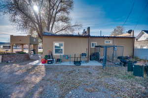 Back of property with a patio area