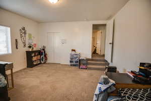 Home office with carpet flooring