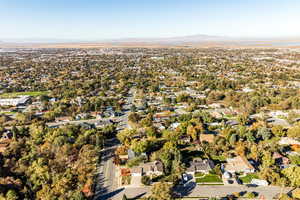 Birds eye view of property with a mountain view