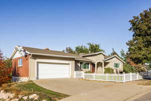 Single story home with a garage