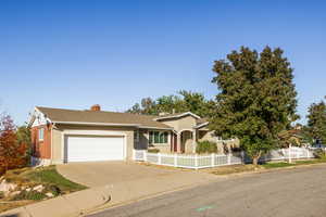 Single story home with a garage