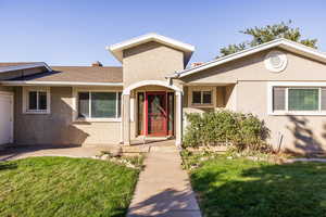 View of front of house featuring a front yard