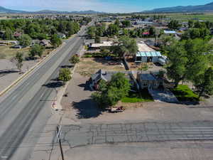 Aerial view of residential area featuring a mountainous background