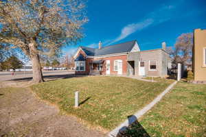 View of front of home with a front yard