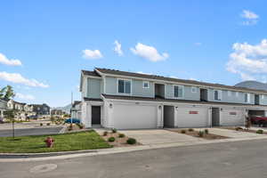 View of front of property with a garage