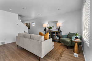 Living room featuring hardwood / wood-style flooring