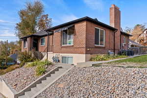 View of home's exterior with cooling unit