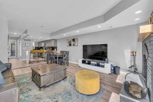 Living room with light wood-type flooring