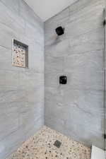 Bathroom with a tile shower