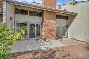 Back of house with a patio area