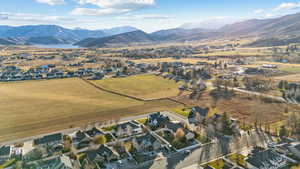 Birds eye view of property with a mountain view