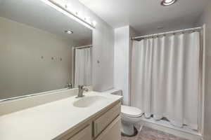 Bathroom with vanity and toilet