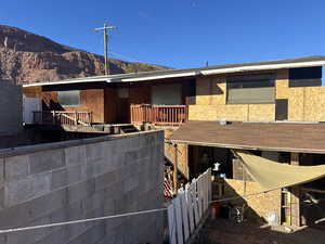 Rear view of property featuring a mountain view