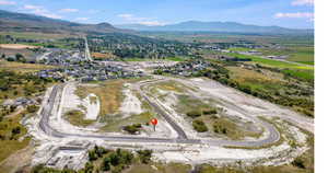 Birds eye view of property featuring a mountain view