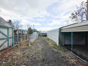 View of yard with a shed