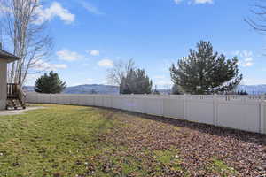 View of yard with a mountain view