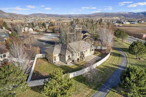 Birds eye view of property with a mountain view