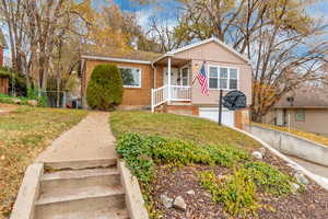 View of front of property with a front yard