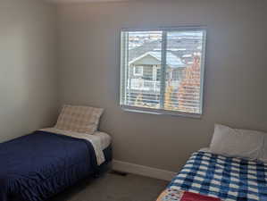 Bedroom with carpet