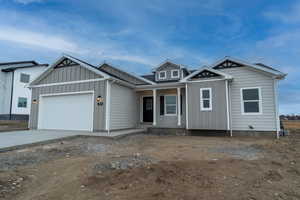 View of front of house with a garage