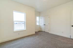 View of carpeted spare room