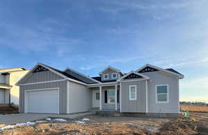 View of front of home featuring a garage