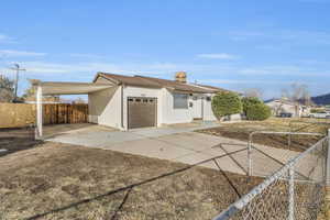 View of front facade featuring a carport