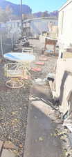 View of patio / terrace with a mountain view