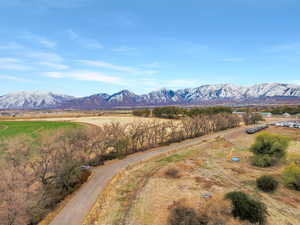 Property view of mountains featuring a rural view