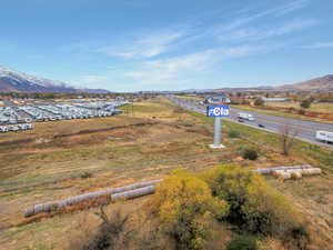 Birds eye view of property featuring a mountain view