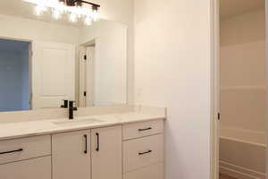 Bathroom featuring vanity